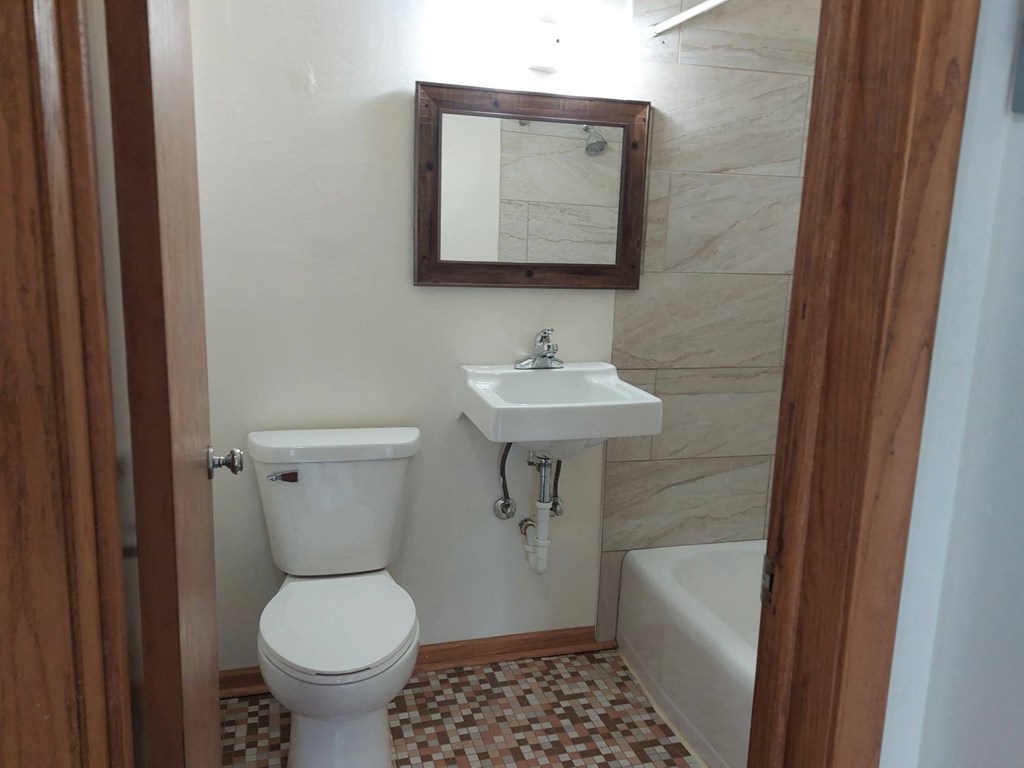 a small bathroom with a toilet and a sink