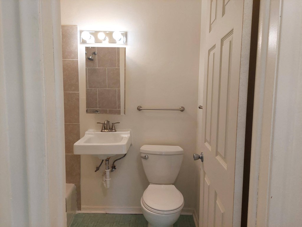 a small bathroom with a toilet and a sink