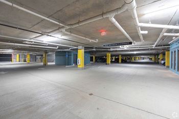 the parking garage is empty and empty of cars