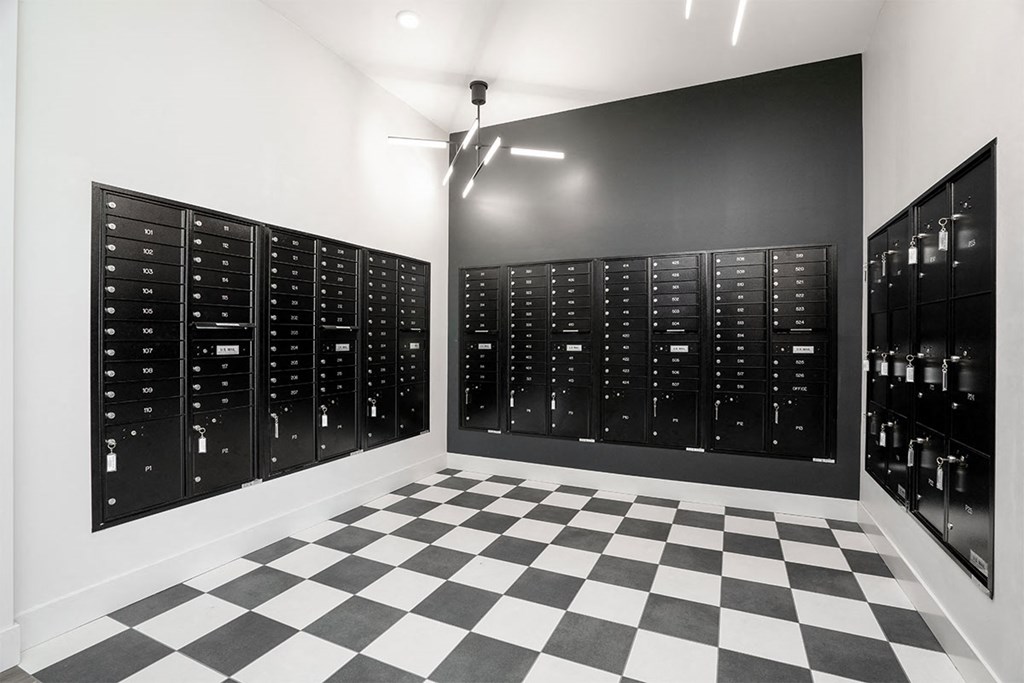 a black and white checkered floor in a room with a bunch of machines