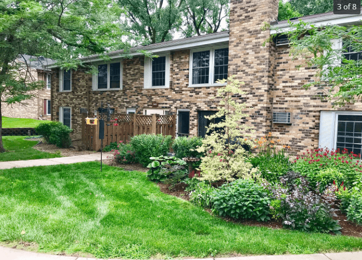 a house with a garden in front of it