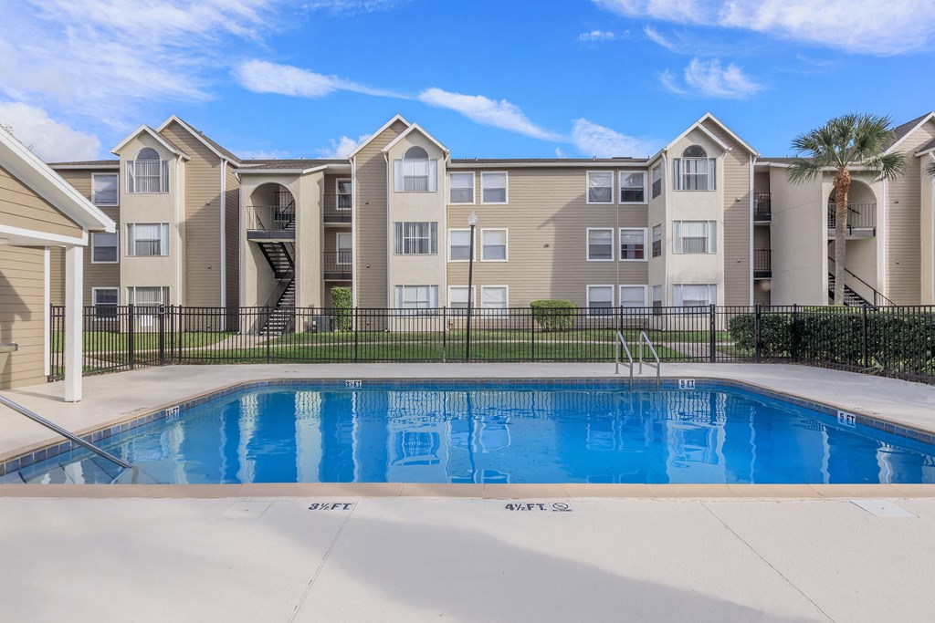 the swimming pool at the preserve at polk apartments
