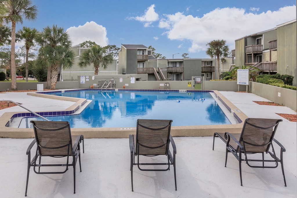 our apartments have a large pool and lounge chairs