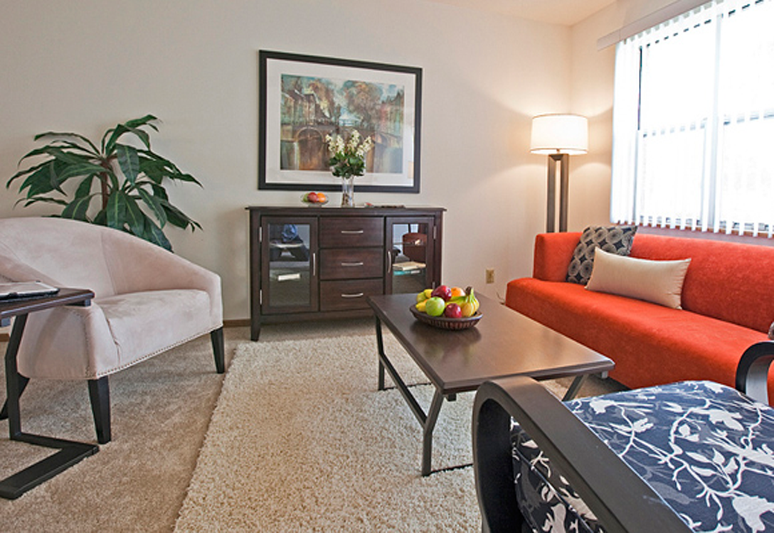 a living room with a couch and a table