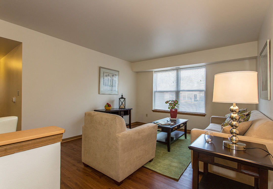 a living room with a couch and a table