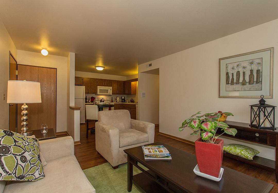 a living room with a couch and a table