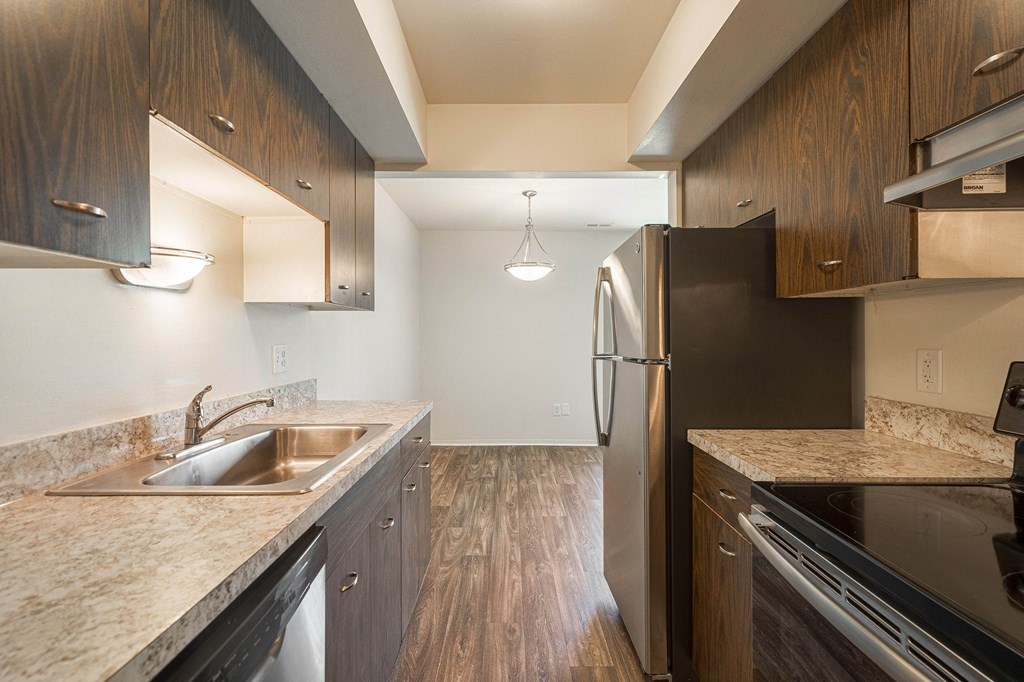 Updated and spacious kitchen at Knottingham Apartments in Clinton Township, MI