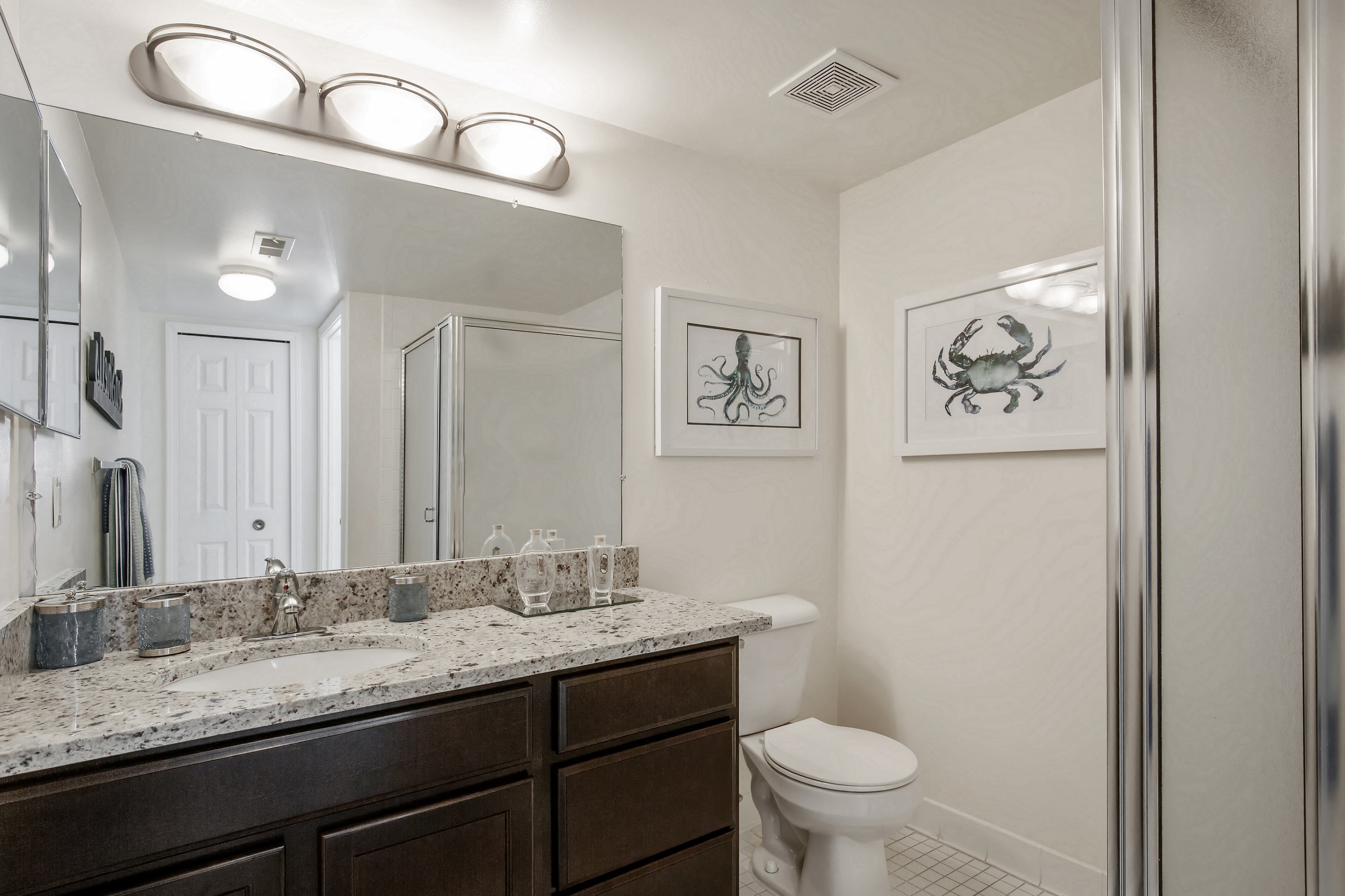 Master Adjoining Bath with Glass Shower at Lakeside Village Apartments Clinton Township MI