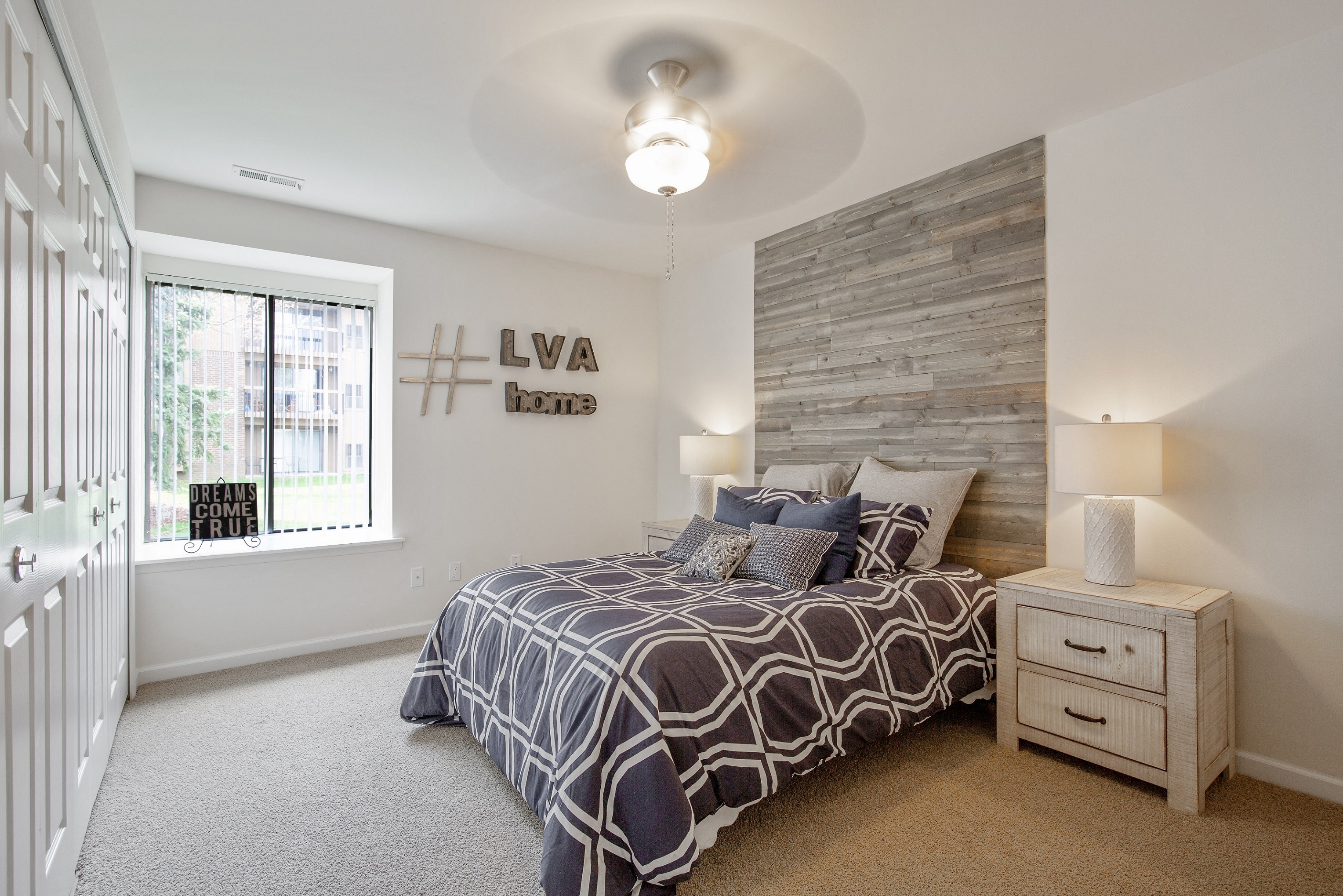 Roomy bedroom with large closets at Lakeside Village Apartments Clinton Township MI