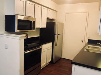 Refrigerator and Kitchen Appliances Refrigerator and Kitchen Appliances, at Three Oaks Apartments, Troy, 46241