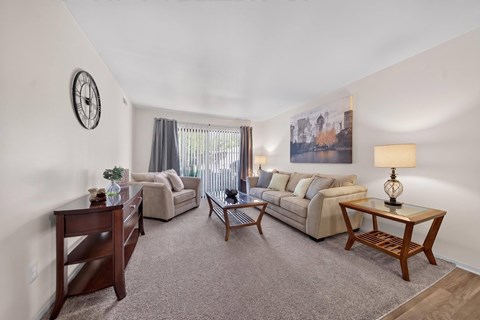 Cozy living room at Eastwood Village Apartments in Clinton Township, MI.
