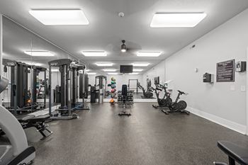Upgraded 24-hour fitness center at Dover Hills Apartments in Kalamazoo, MI.