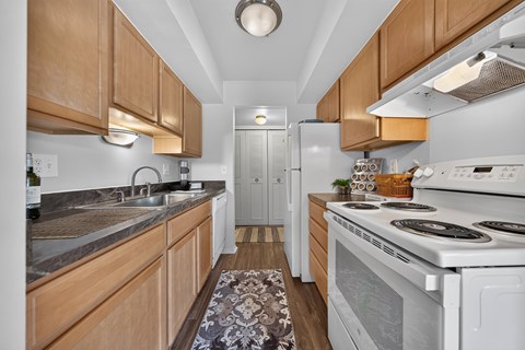 Efficient kitchen at Drawbridge Apartments in Harrison Township, MI.