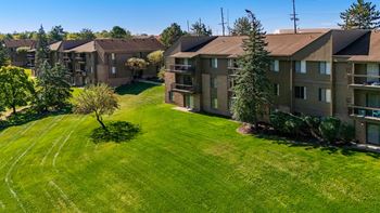 Expansive green space at Franklin River Apartments in Southfield, MI.