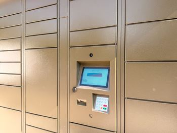 24-hour package locker system at Dover Hills Apartments in Kalamazoo, MI.