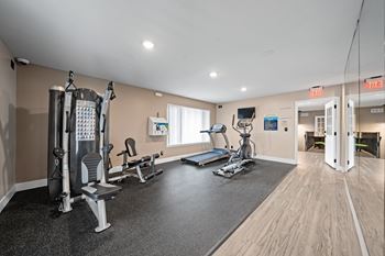 Updated 24-hour fitness and wellness center at Knottingham Apartments in Clinton Township, MI.