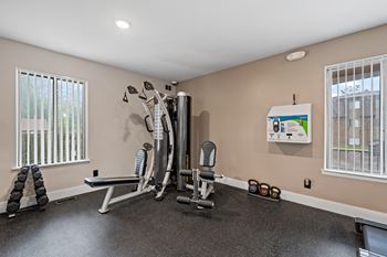 Updated 24-hour fitness and wellness center at Knottingham Apartments in Clinton Township, MI.