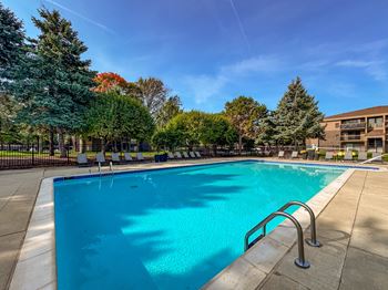 2 heated swimming pools with sundecks at Lakeside Village Apartments in Clinton Township, MI.