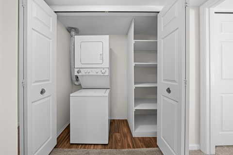 Spacious In-unit Laundry and Linen Closet at Lakeside Village Apartments Clinton Township MI