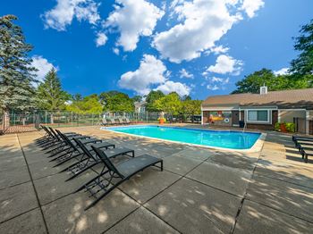 Heated swimming pool with sundeck at Park Lane Apartments in Southfield, MI.