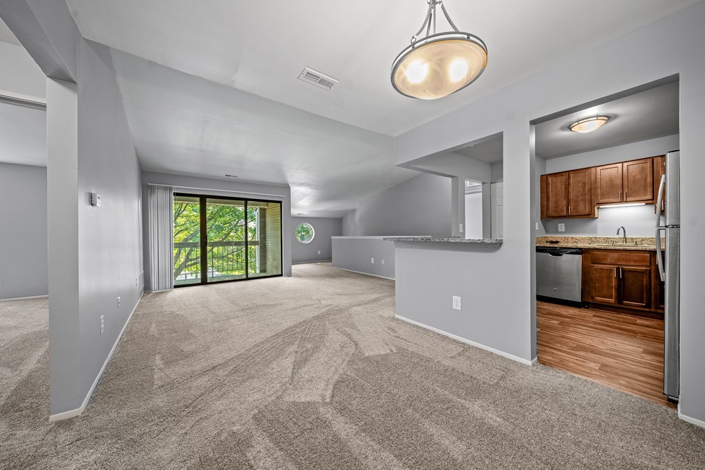 A spacious living room with open floor layout at Park Lane Apartments in Southfield