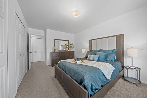 Bedroom with Ample storage space at Prentiss Pointe Apartments in Harrison Township, MI