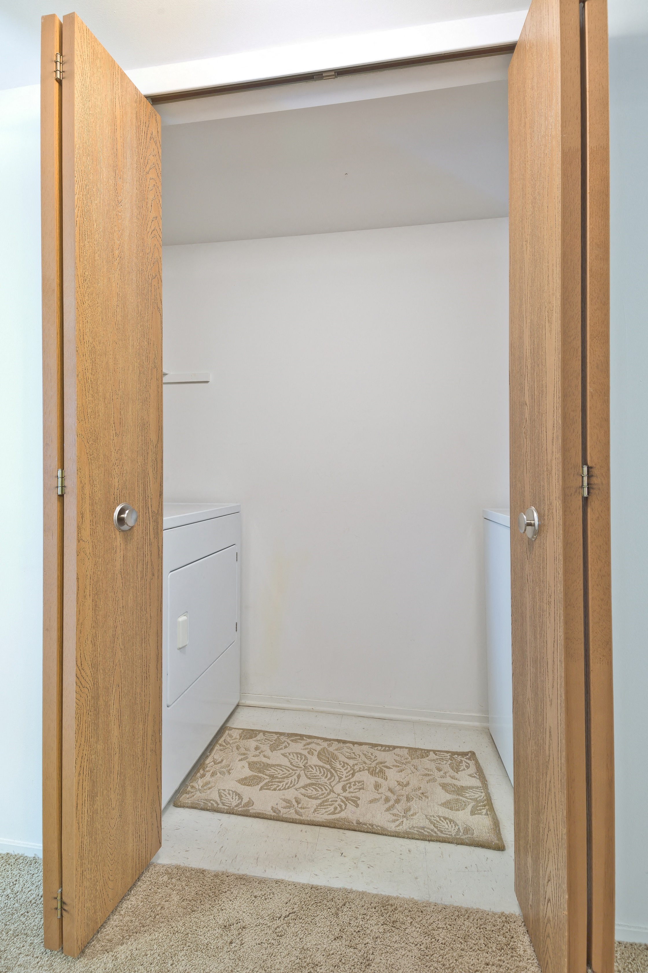 Full-size washer/dryer closet at Lakeside Village Apartments Clinton Township MI