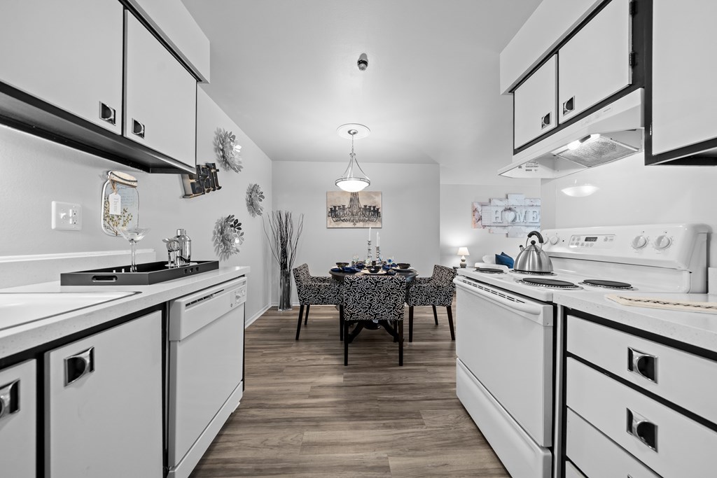 A modern kitchen/dining at Westwood Village Apartments in Westland