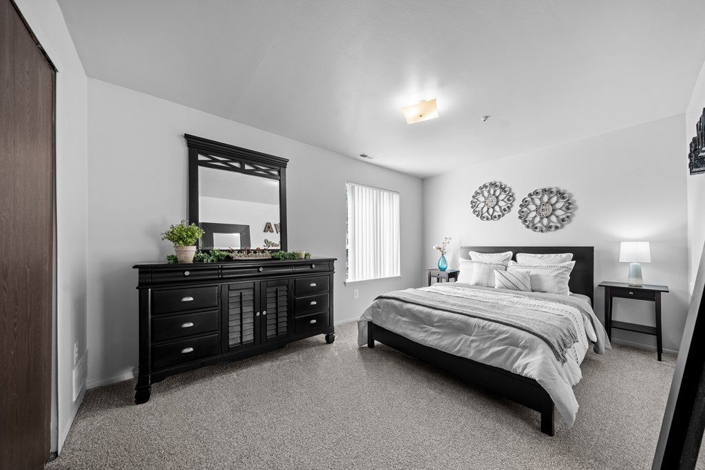 Big bedroom with natural lighting at Westwood Village Apartments in Westland, MI