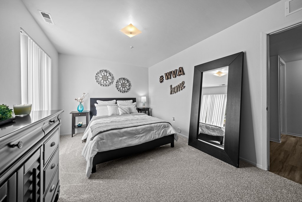 Big bedroom with natural lighting at Westwood Village Apartments in Westland, MI