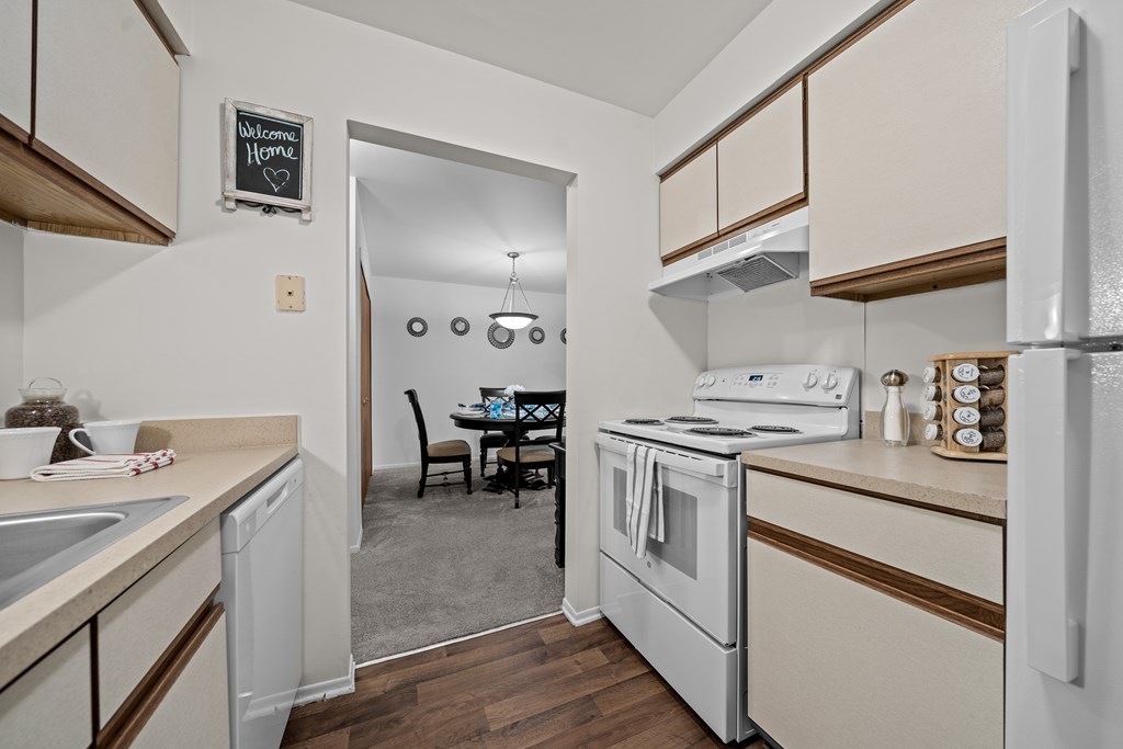 Cozy dining room connected to kitchen at Westwood Village Apartments in Westland, MI