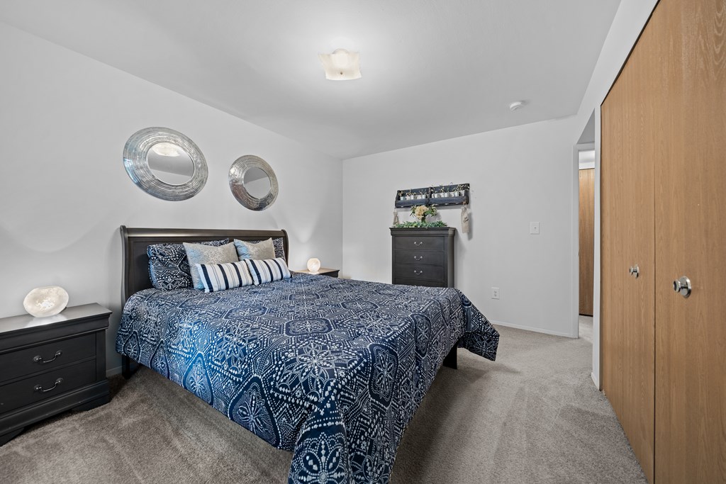 Spacious bedroom at Westwood Village Apartments in Westland, MI