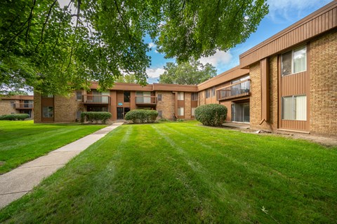 Cozy building exterior at Westwood Village Apartments in Westland, MI.