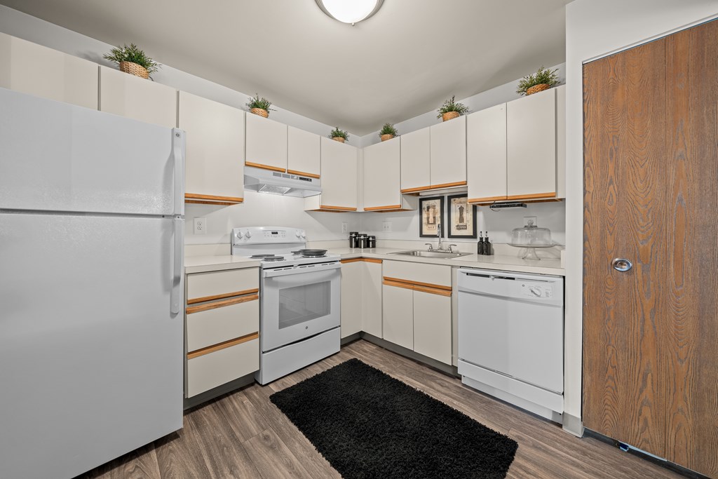 Spacious kitchen with white appliances at Park Lane Apartments in Southfield