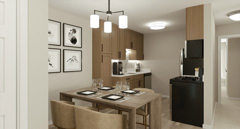 A modern kitchen with a dining table set for two.