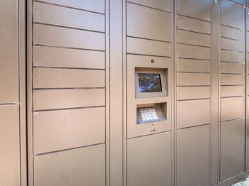 24-hour package locker system at Lakeside Village Apartments in Clinton Township, MI.
