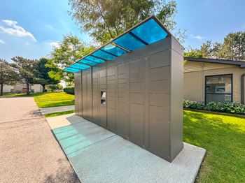 24-hour secure package locker system at Woodland Villa Apartments in Westland, MI.