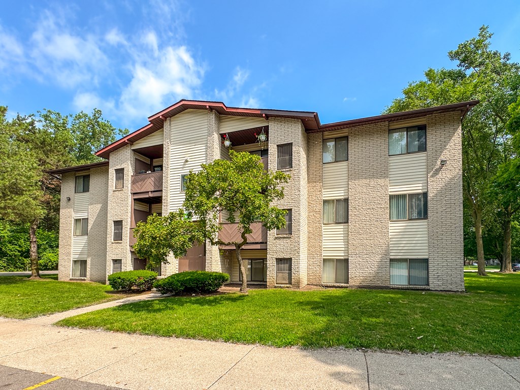 Exterior of cozy apartment homes at Woodland Villa Apartments in Westland, MI.