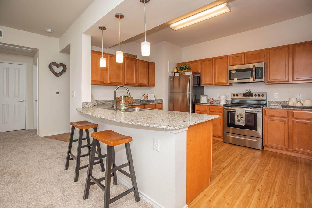 Gourmet Kitchen at Mariposa at Clear Creek Webster 55+ Apartments, Webster, TX