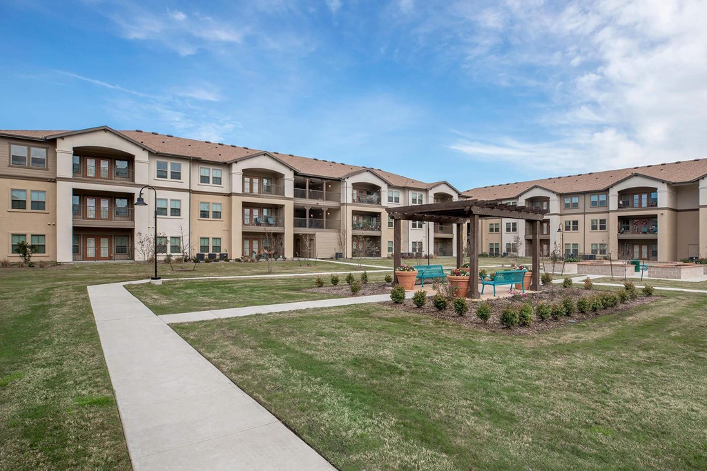Green Space Walking Trail at Mariposa at Clear Creek Webster 55+ Apartments, Texas
