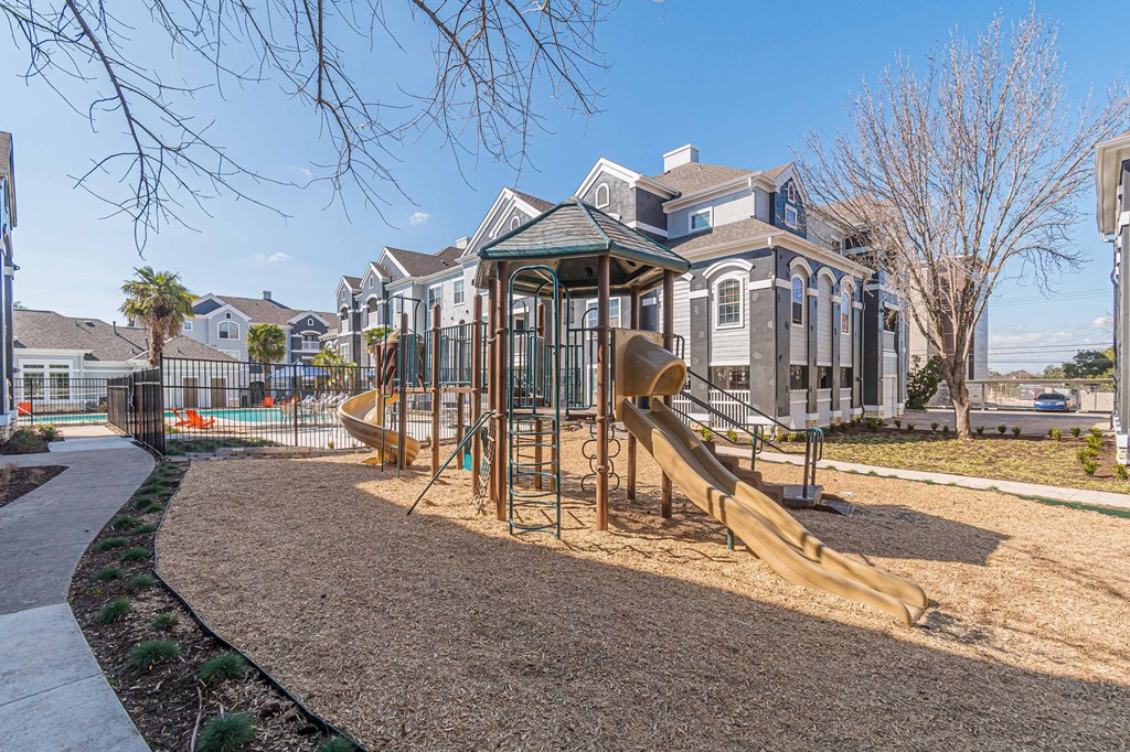 commons playground with slides commons playground with slides at Capitol Crossing, Austin Texas