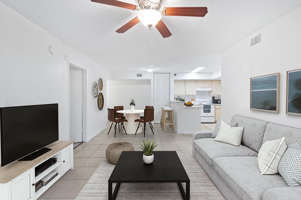 a living room with a couch and a table