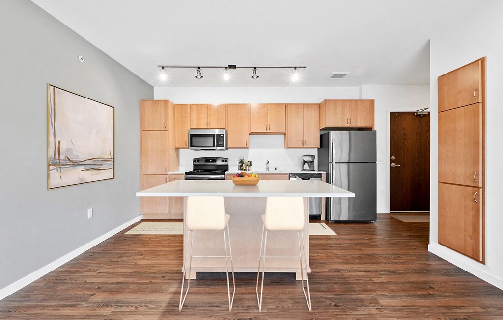 Kitchen area with dining at 1500 Nicollet Apartment Homes, Minnesota