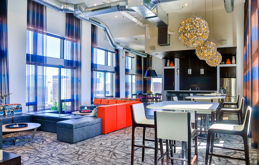 Clubroom with coffee table at Arcade Apartments, Missouri, 63101