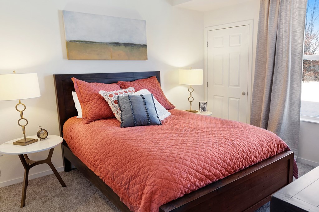 Red Bedroom With Window at The Bluffs at Liberty Glen, St. Cloud  