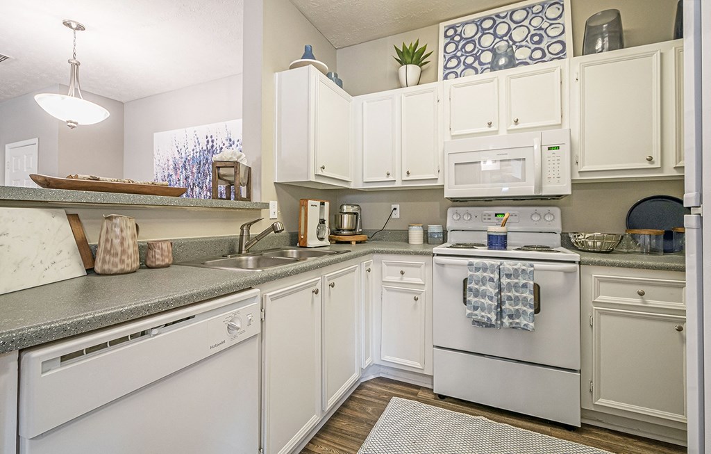 Kitchen with White cabinets at Canterbury Ridge, Canton