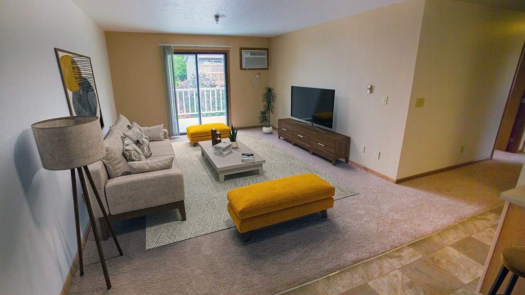 a living room with a couch and a tv at The Villages at Essex Park, Minnesota, 55901