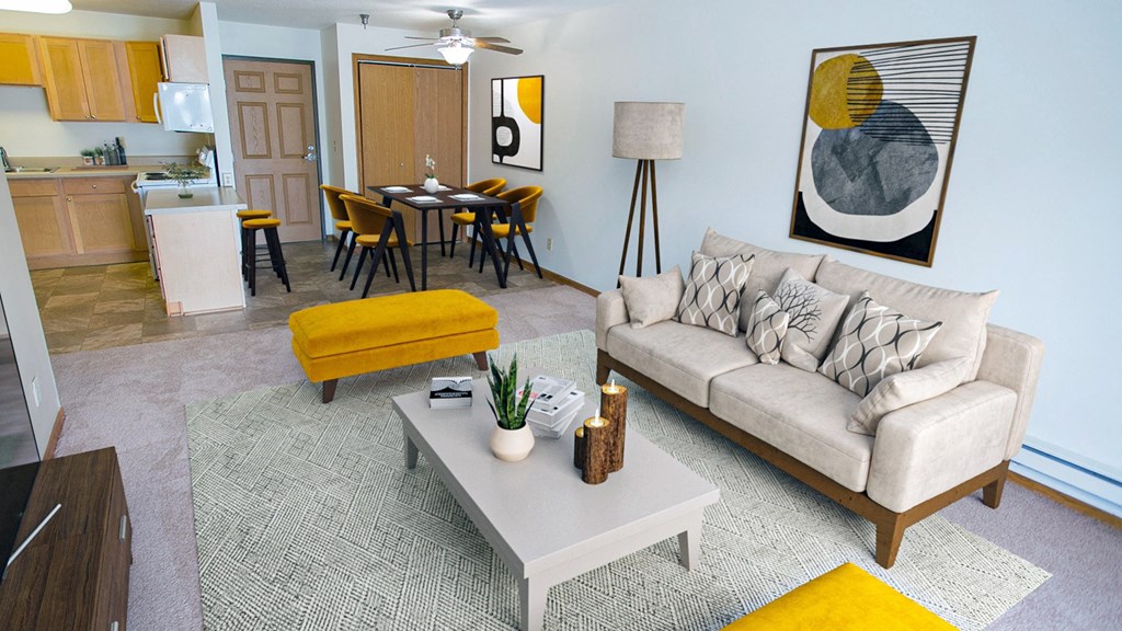 a living room with a couch and a table at The Villages at Essex Park, Minnesota