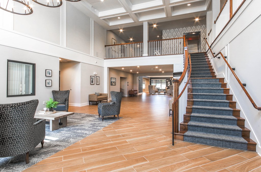 Lobby And Staircase at Haven at Congaree Pointe 55+ Apartments, Columbia, SC 29209