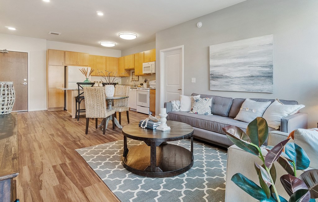Living Area With Kitchen at Legacy Commons at Signal Hills 55+ Apartments, West St. Paul